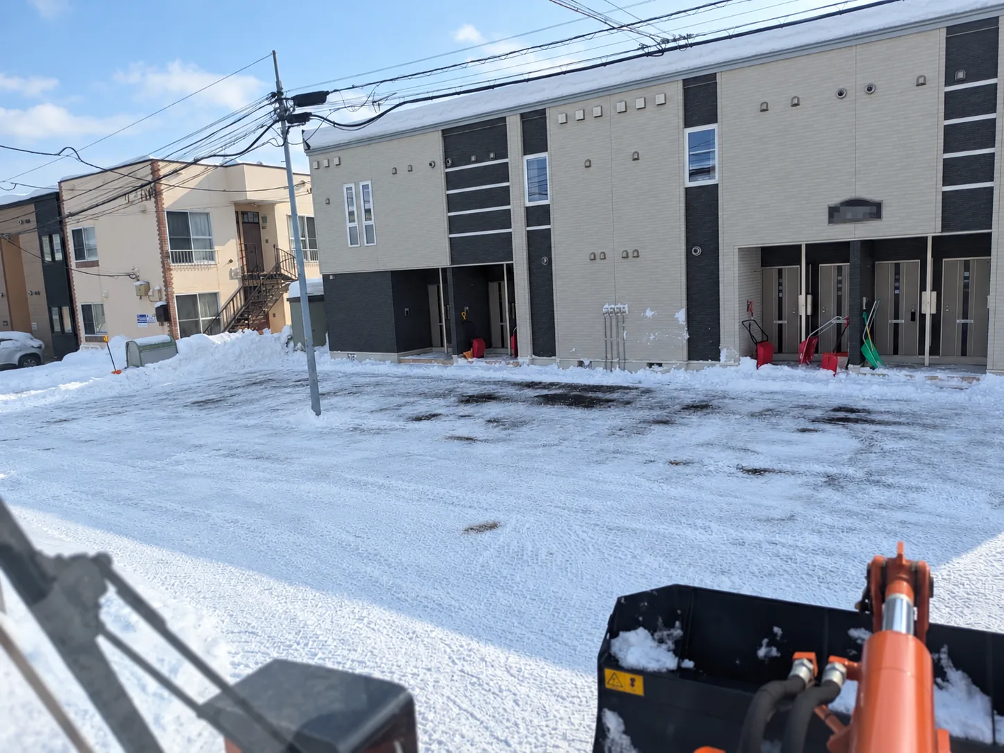 アパート敷地内の除雪・排雪作業後の様子